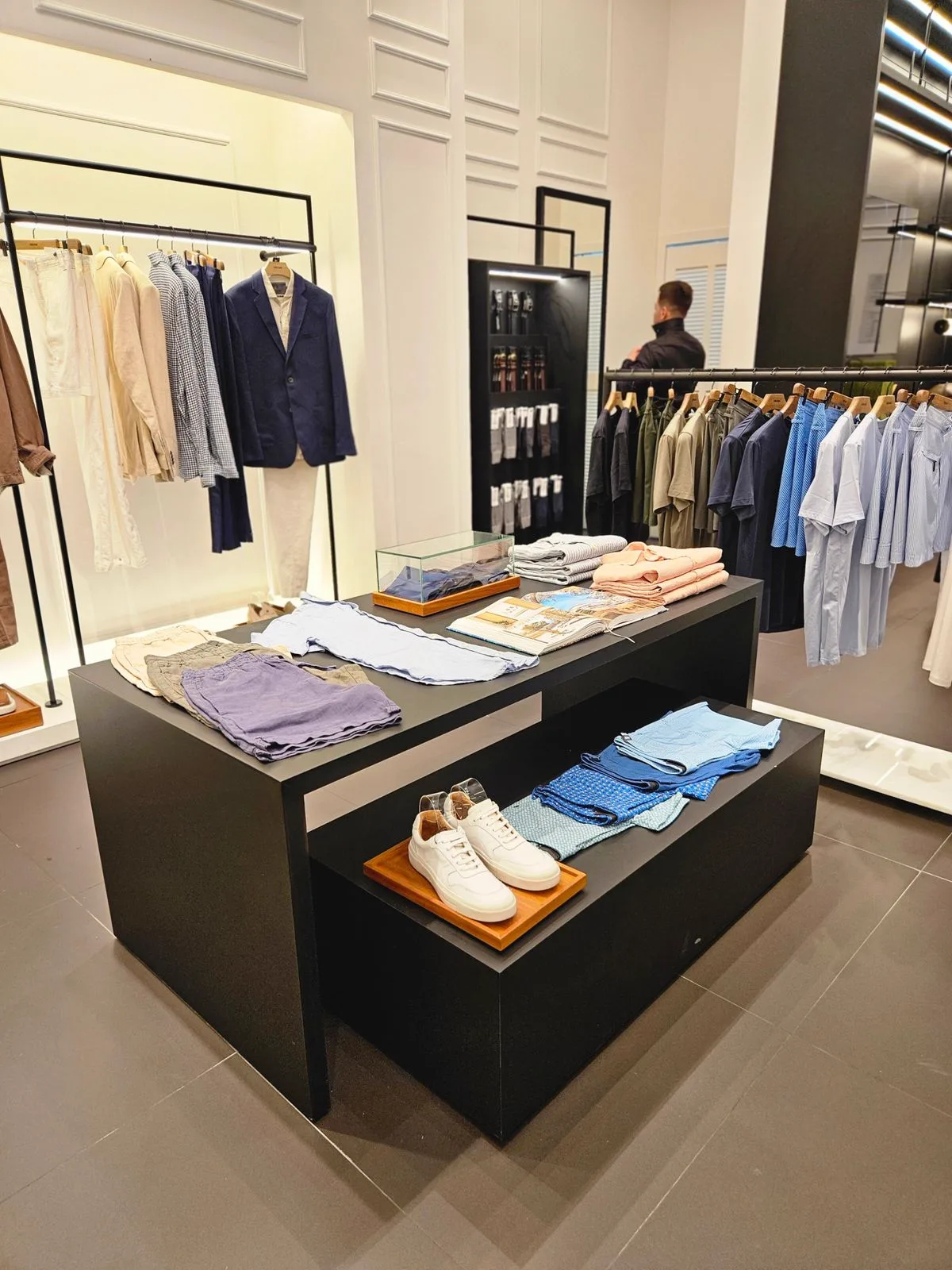 Modern retail storefront with product displays